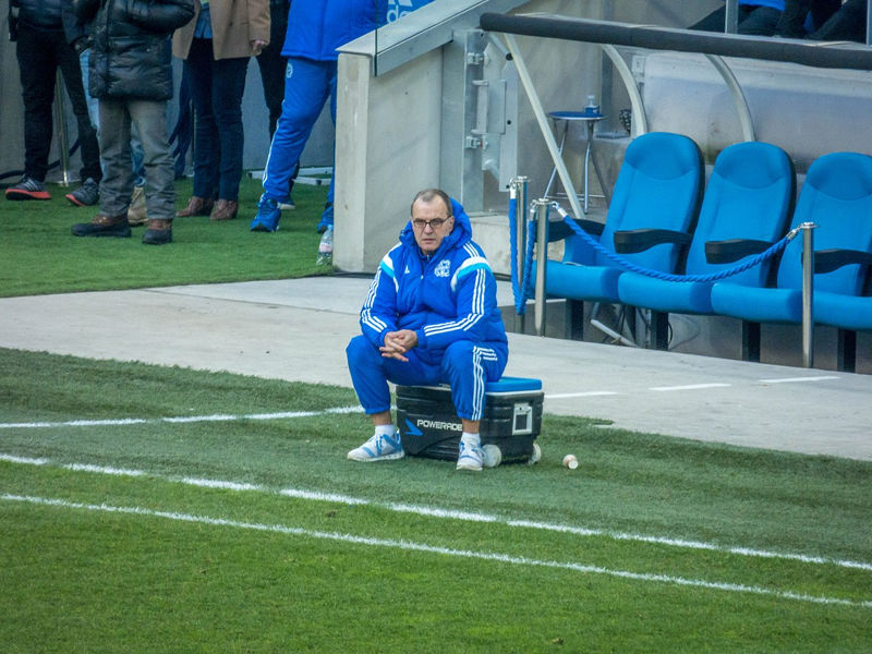 Marcelo Bielsa sitting on cooler at football match