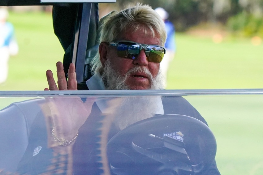 John Daly waving