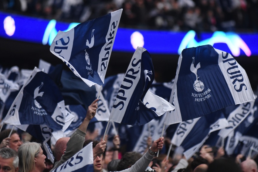 Spurs fans raise their flags